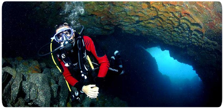Diver exploring La Palma's volcanic seabed